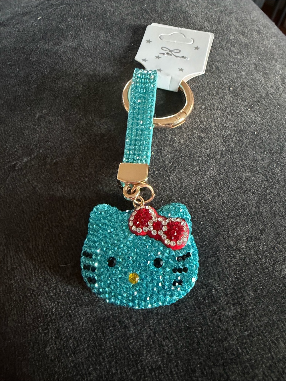 Sparkling Teal Cat Face Keychain with Red Bow